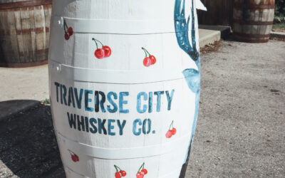 Traverse City Whiskey Co. Rolls Out the Painted Barrels to Celebrate National Cherry Festival